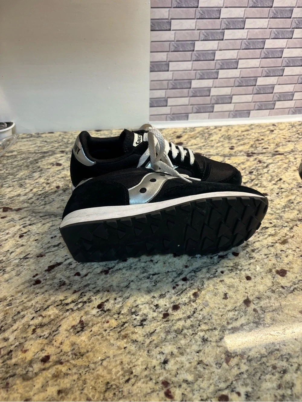 Saucony Black and Silver Retro Runner Sneakers